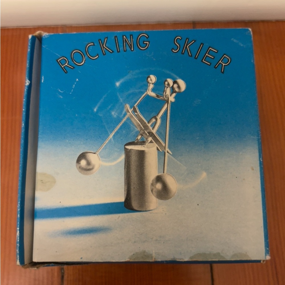 Set of two Rocking Kinetic Skiers . Only one box